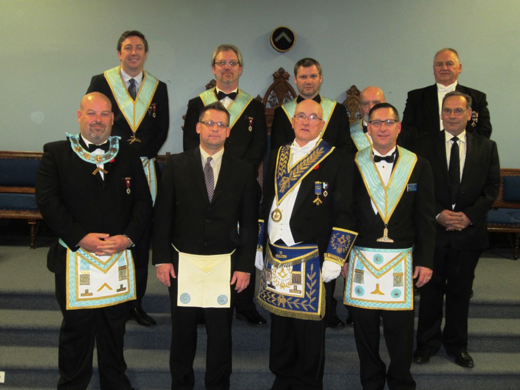 Front Row left to right W. Master Meurwyn Jeffreys,Bro. James Pollari, R.W. Bro. John Henry Lewis DDGM of Algoma East District, Bro. Joseph Allan, Bro. Brian Bouchard. Back Row left to right Bro. Paul Skeggs, Bro. Denis Adshead, Bro. Chris Morianti, W. Bro. Richard Hannah, R.W. Bro. Stephen Koivisto.
