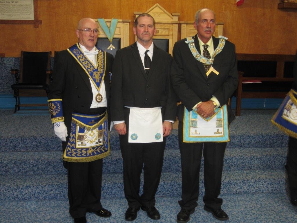 R.W. Bro. John Henry Lewis (DDGM Algomaeast District) Bro. Steven Whitfield (Candidate) W. Bro. Ben Webster (Worshipful Master For Dyment Lodge). 