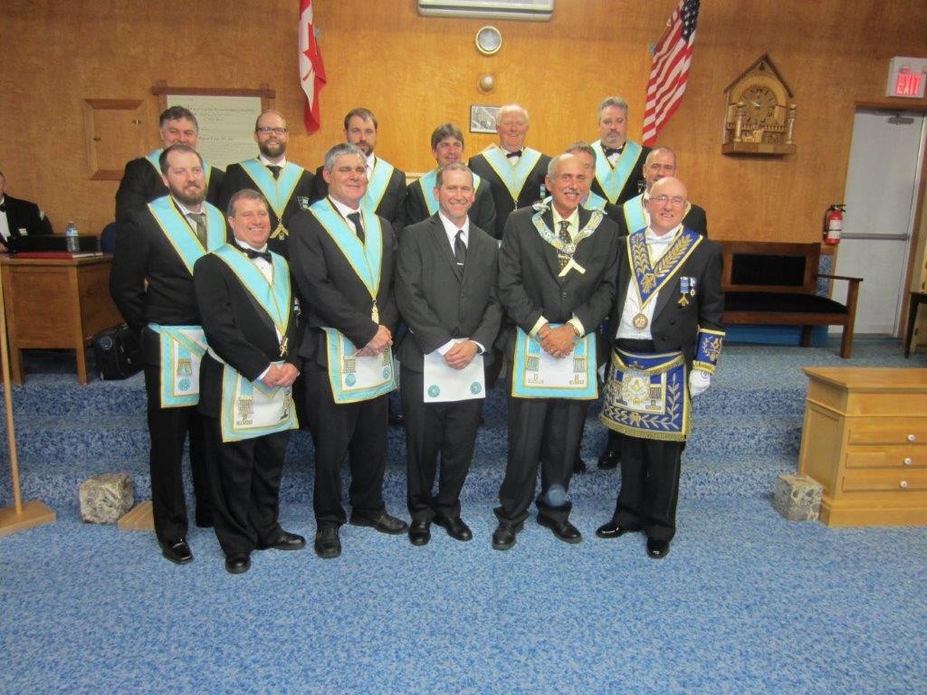 Dyment Lodge Officers, (Centre) Bro. Steven Whitfield is the candidate for the evening. R.W. Bro. John Henry Lewis (Front row on far right) on his DDGM Official Visit Dec 10, 2015.